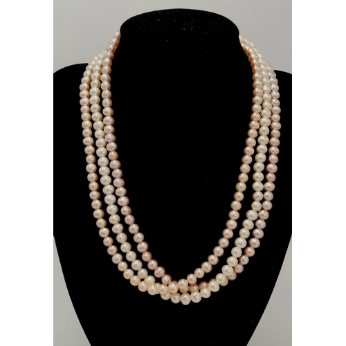 1284 - A 3 ROW CULTURED PEARL NECKLACE WITH 9K GOLD CLASP , APPROX 47CM IN LENGTH , 70G TOTAL WEIGHT. Ref: ... 