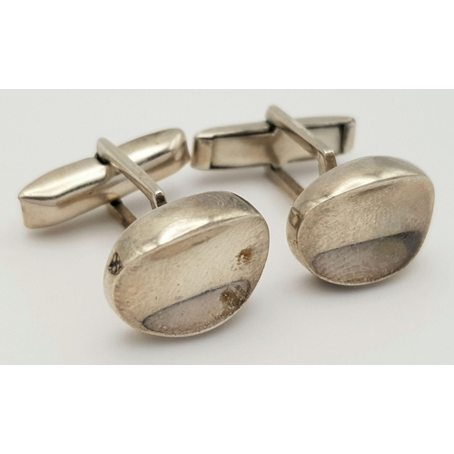 1290 - Two Pairs of Solid Silver 925 Stylish Cufflinks, Total weight: 28.8 grams. In very good condition.