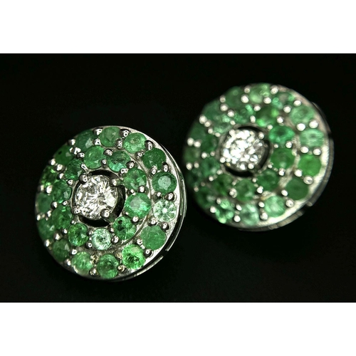 101 - An 18K White Gold, Emerald, Diamond GIA Certified Jewellery Set. An 18K Gold, Emerald, diamond circu... 