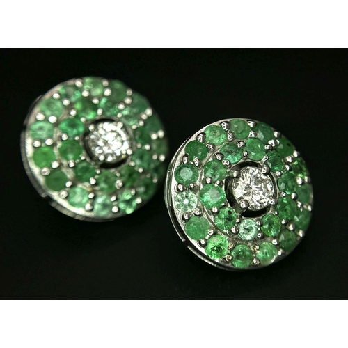 101 - An 18K White Gold, Emerald, Diamond GIA Certified Jewellery Set. An 18K Gold, Emerald, diamond circu... 