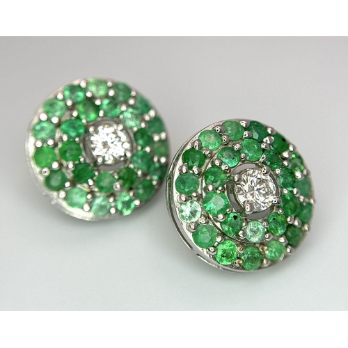 101 - An 18K White Gold, Emerald, Diamond GIA Certified Jewellery Set. An 18K Gold, Emerald, diamond circu... 