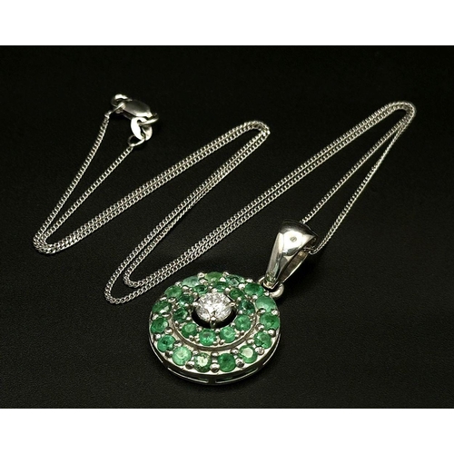 101 - An 18K White Gold, Emerald, Diamond GIA Certified Jewellery Set. An 18K Gold, Emerald, diamond circu... 