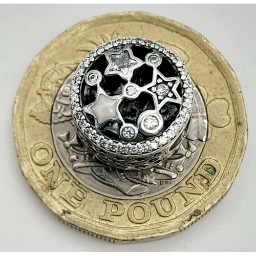 893 - A PANDORA STERLING SILVER STONE SET STARS CHARM 2.5G TOTAL WEIGHT, 1CM DIAMETER. Ref: SC 8036