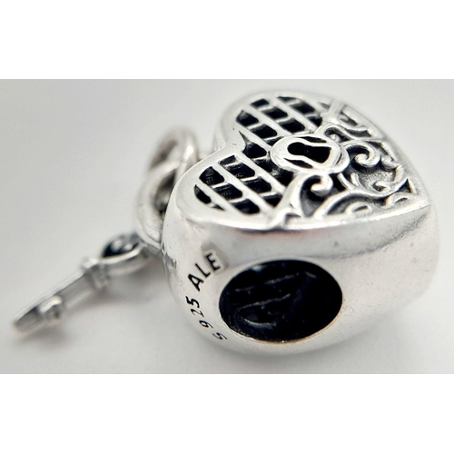 900 - A PANDORA STERLING SILVER HEART LOCKET & KEY CHARM 3.6G TOTAL WEIGHT, 1CM x 1CM. Ref: SC 8037