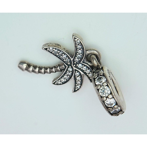 879 - A PANDORA STERLING SILVER STONE SET PALM TREE DANGLE CHARM 2.6G TOTAL WEIGHT, 2.5CM x 1CM. Ref: SC 8... 