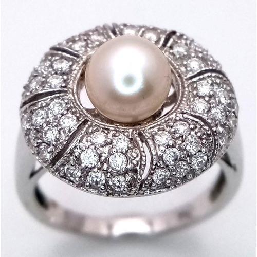 1298 - AN 18K WHITE GOLD DIAMOND & PEARL SET RING. 6.1G, SIZE N. Ref: TAN 7009