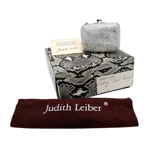 150 - A Judith Leiber Silver Rhinestone Mini Clutch Bag. Silver-tone rhinestone exterior with matching sil... 