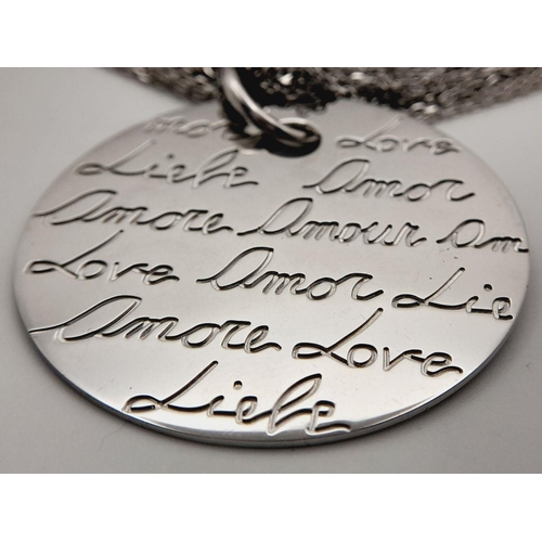 930 - A STERLING SILVER MULTI STRAND NECKLACE WITH PENDANT ENGRAVED WITH THE WORD LOVE IN MANY LANGUAGES 3... 