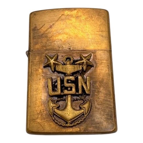 384 - A Vietnam war era US Navy Anchor Zippo Lighter. Approximately 5.5cm height x 3.5cm width. Please see... 