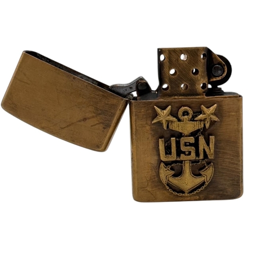 384 - A Vietnam war era US Navy Anchor Zippo Lighter. Approximately 5.5cm height x 3.5cm width. Please see... 