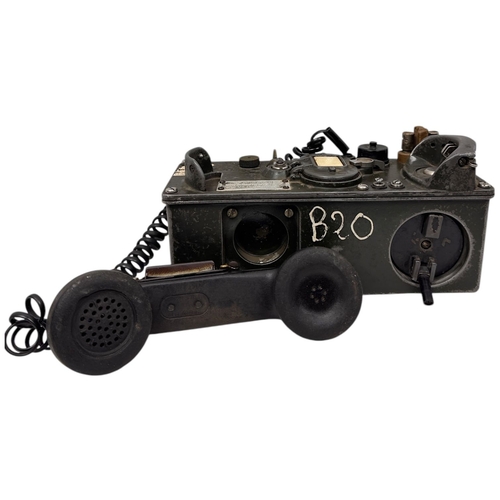 916 - A Vietnam war era US Army  H60/PT Military Field Telephone. Coiled cord connects the handset to the ... 