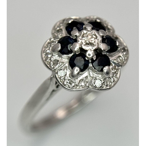 1100 - AN 18K WHITE GOLD DIAMOND & SAPPHIRE RING 4.1G TOTAL WEIGHT, SIZE J 1/2. Ref: SC 8084