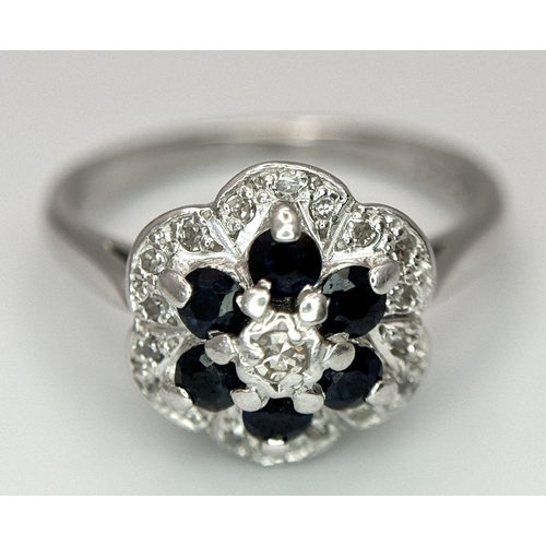 1100 - AN 18K WHITE GOLD DIAMOND & SAPPHIRE RING 4.1G TOTAL WEIGHT, SIZE J 1/2. Ref: SC 8084