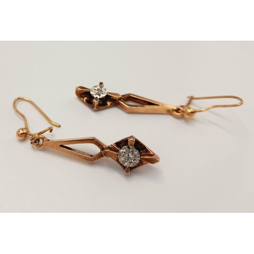 11 - A Pair of 9K Yellow Gold Diamond Drop Earrings. Art deco in style. 3cm drop. 3.5g total weight.