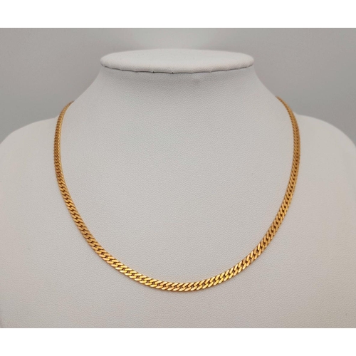 15 - A 9K Yellow Gold Petit Curb Link Choker Necklace. 36cm. 10.2g