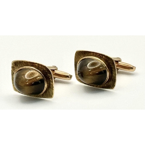 337 - A Pair of Vintage 9K Yellow Gold Tigers Eye Cufflinks. Brilliantly crafted with quality Tigers eye c... 