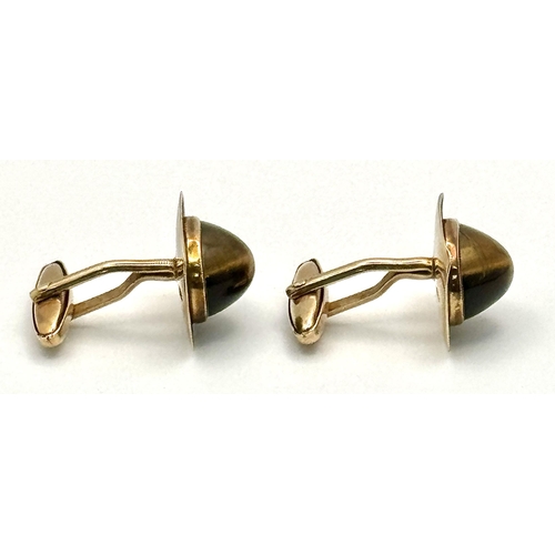 337 - A Pair of Vintage 9K Yellow Gold Tigers Eye Cufflinks. Brilliantly crafted with quality Tigers eye c... 