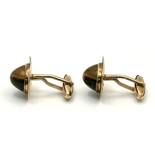 337 - A Pair of Vintage 9K Yellow Gold Tigers Eye Cufflinks. Brilliantly crafted with quality Tigers eye c... 