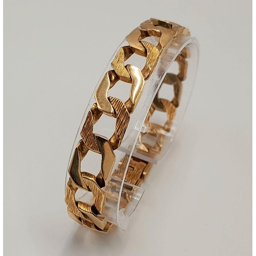 4 - A Chunky 9K Yellow Gold Curb Bracelet with Bark Effect Decoration. 18cm. 27g