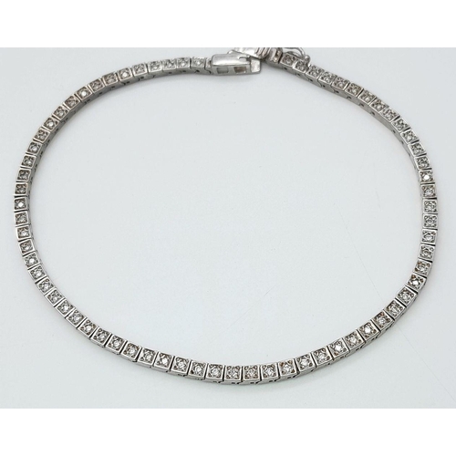 456 - A 14K White Gold Tennis Bracelet. 19cm. 8.6g total weight.