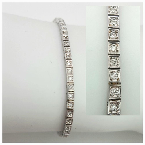 456 - A 14K White Gold Tennis Bracelet. 19cm. 8.6g total weight.