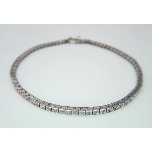 456 - A 14K White Gold Tennis Bracelet. 19cm. 8.6g total weight.