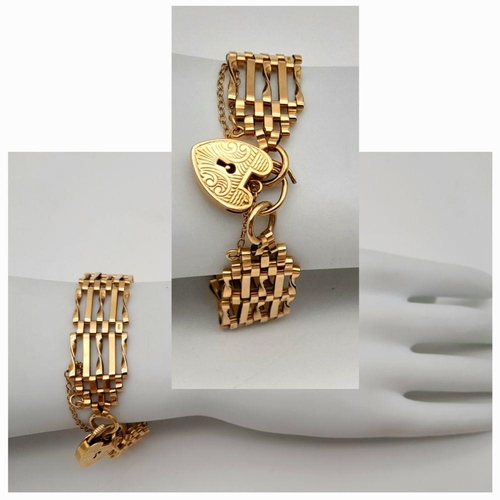 5 - A 9K Yellow Gold Gate Bracelet with Heart Clasp and Safety Chain. 16mm width. 16cm length. 17.5g