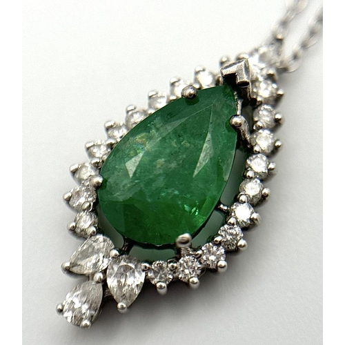 722 - A 9K Gold, Emerald and Diamond Pendant on a 9K Gold Disappearing Necklace. 2cm and 44cm. 2.5g total ... 