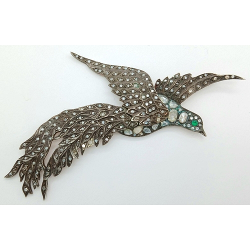 904 - An Antique 14K Gold and Silver Flying Bird Pendant with Diamond Decoration Throughout - and an Emera... 