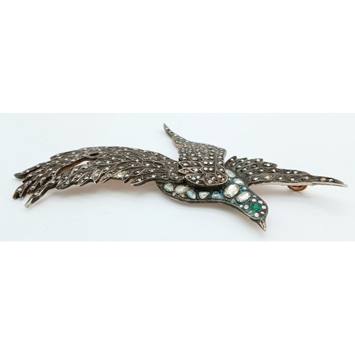 904 - An Antique 14K Gold and Silver Flying Bird Pendant with Diamond Decoration Throughout - and an Emera... 