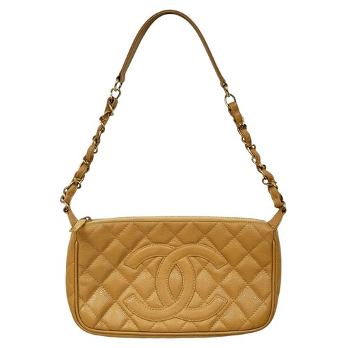 115 - A Chanel Beige Caviar Leather Shoulder Bag. Beige caviar leather exterior with gold-toned hardware a... 