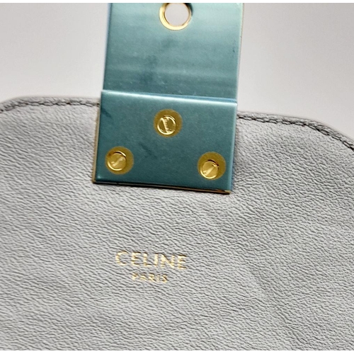 143 - A Celine Metallic Silver Quilted Shoulder Bag. Metallic silver leather exterior with quilted detaili... 