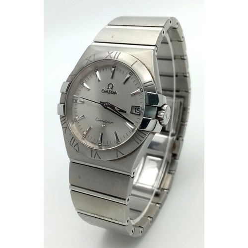 234 - An Omega Constellation Gents Watch. Stainless steel bracelet and case - 35mm. Quartz movement. Model... 