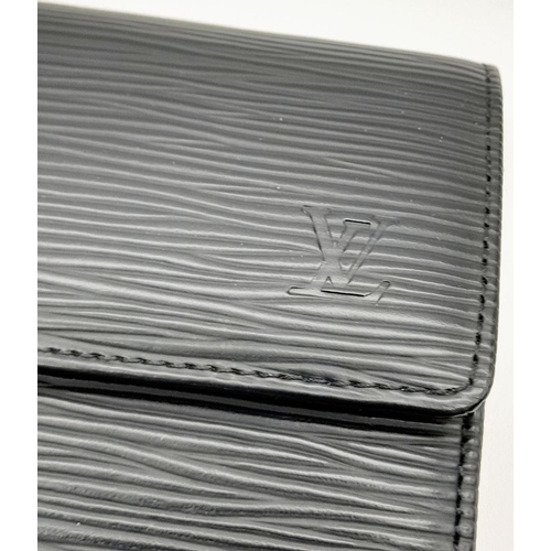 241 - A Louis Vuitton Black Epi Leather Sarah Wallet. Black Epi leather exterior with silver-toned hardwar... 