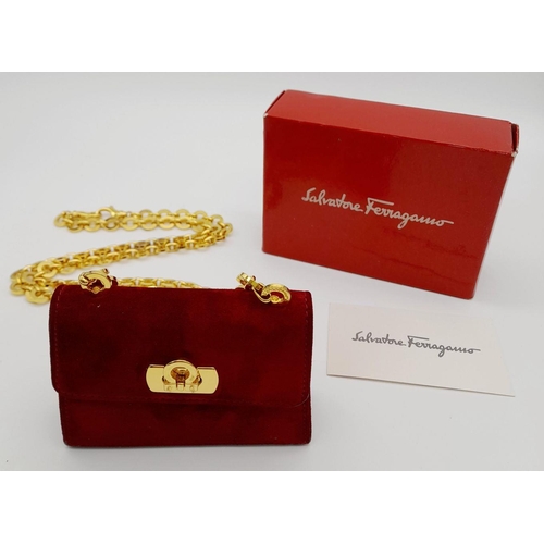 998 - A Salvatore Ferragamo Bordeaux Red Suede Mini Bag. Bordeaux Red suede exterior with gold-toned hardw... 