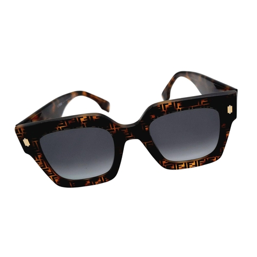 690 - A Pair of Designer Fendi 'Tortoiseshell Effect' Ladies Sunglasses. Comes with COA, pouch and box.