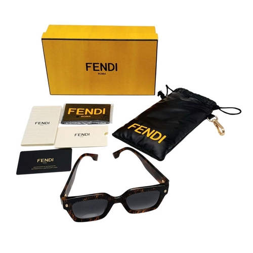 690 - A Pair of Designer Fendi 'Tortoiseshell Effect' Ladies Sunglasses. Comes with COA, pouch and box.