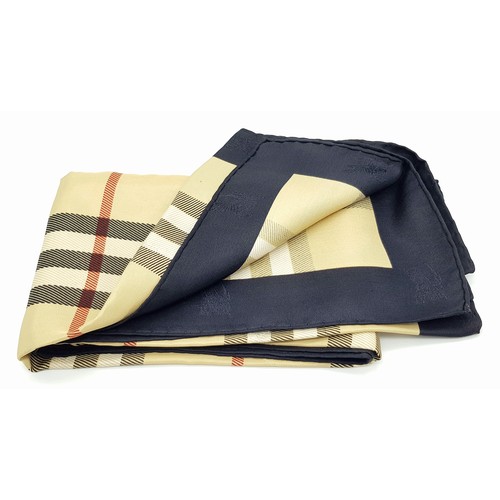 1178 - A Burberry Vintage Check Silk Scarf. Crafted from soft silk in a beige, black, and red vintage check... 