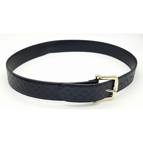 718 - A Gucci Soft Microguccissima Margaux Calfskin Belt. Black leather with GG monogram embossed design a... 