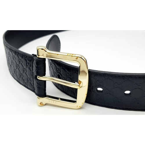 718 - A Gucci Soft Microguccissima Margaux Calfskin Belt. Black leather with GG monogram embossed design a... 