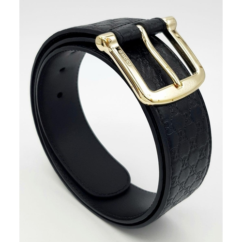 718 - A Gucci Soft Microguccissima Margaux Calfskin Belt. Black leather with GG monogram embossed design a... 