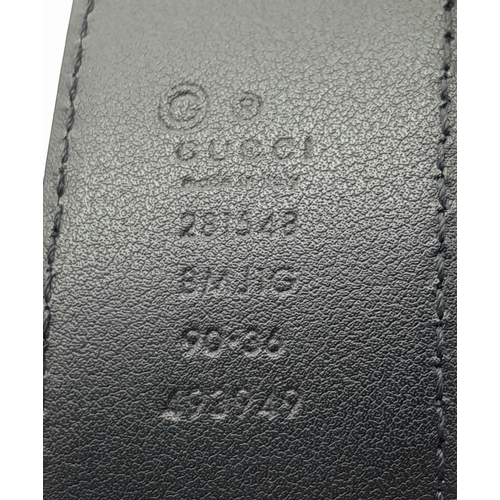 718 - A Gucci Soft Microguccissima Margaux Calfskin Belt. Black leather with GG monogram embossed design a... 