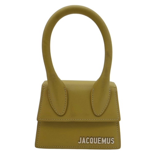 725 - A Jacquemus Le Chiquito Olive Green Mini Bag. Olive green leather exterior with silver-toned hardwar... 