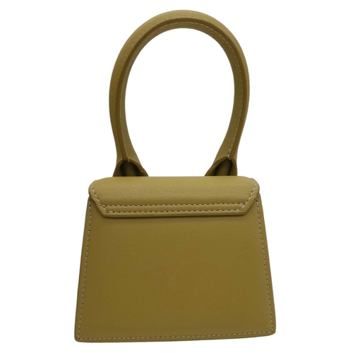 725 - A Jacquemus Le Chiquito Olive Green Mini Bag. Olive green leather exterior with silver-toned hardwar... 