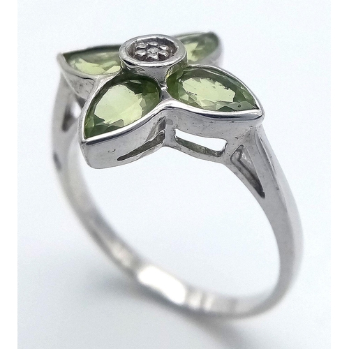 1117 - A Sterling Silver Peridot and Diamond Set Ring Size O. The Crown Measures 1.5cm Wide and the Ring We... 