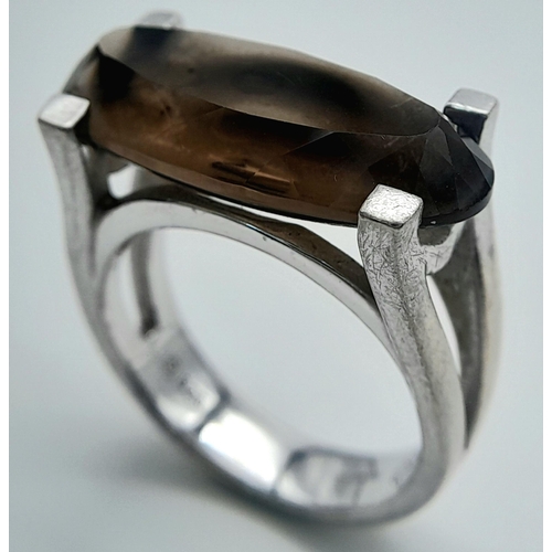 1158 - A 2009 Hallmarked Unisex Modernist Design Smoky Quartz Ring Size T. The Ring is Set with a 2.4cm Lon... 