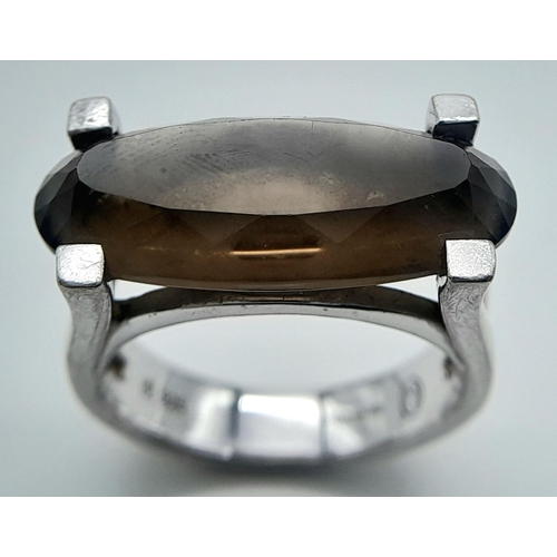 1158 - A 2009 Hallmarked Unisex Modernist Design Smoky Quartz Ring Size T. The Ring is Set with a 2.4cm Lon... 