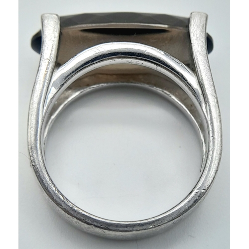 1158 - A 2009 Hallmarked Unisex Modernist Design Smoky Quartz Ring Size T. The Ring is Set with a 2.4cm Lon... 