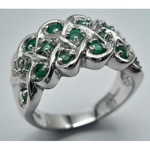 761 - A Hallmarked 2005 Sterling Silver Emerald Set Ring Size R. The Ring Measures 1.2cm Wide at the crown... 