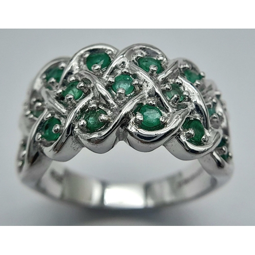 761 - A Hallmarked 2005 Sterling Silver Emerald Set Ring Size R. The Ring Measures 1.2cm Wide at the crown... 